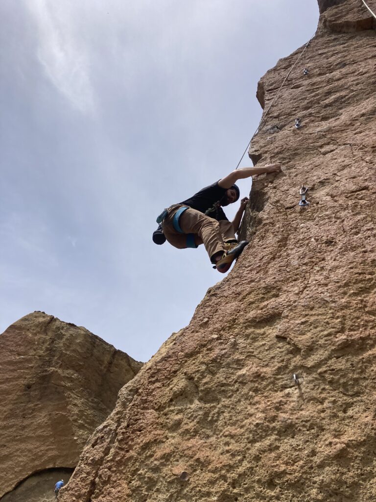 man arete climbing at smith rock